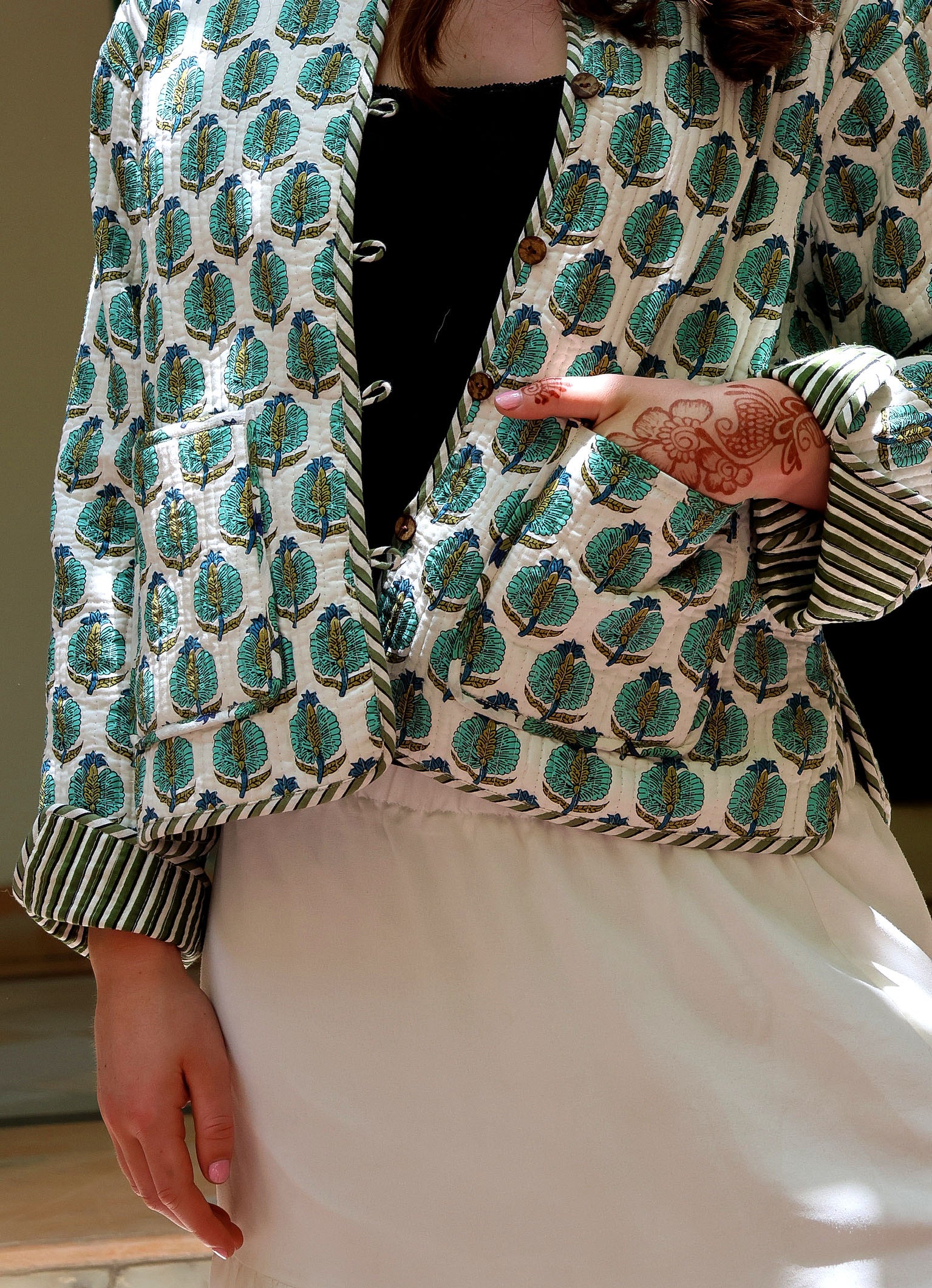 Willow hand in pocket from front in courtyard